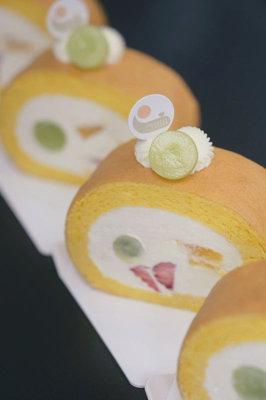 A Japanese Roll Cake with light, airy sponge, rich creamy filling, and fresh seasonal fruits for a naturally sweet, vibrant, and refreshing dessert