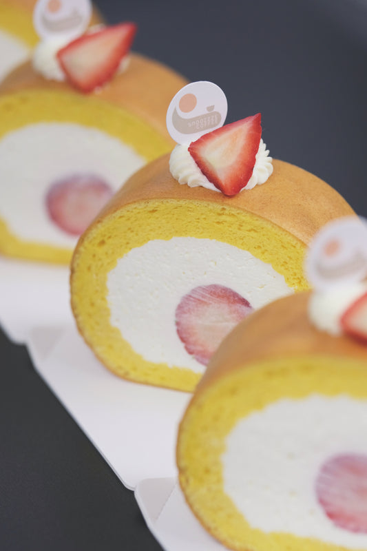 A fluffy Japanese Roll Cake with airy sponge, light cream, and fresh strawberries for a perfectly balanced, melt-in-your-mouth dessert